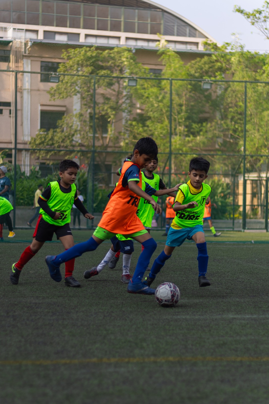 Young children dribbling during an FC Real Bengaluru kids football session